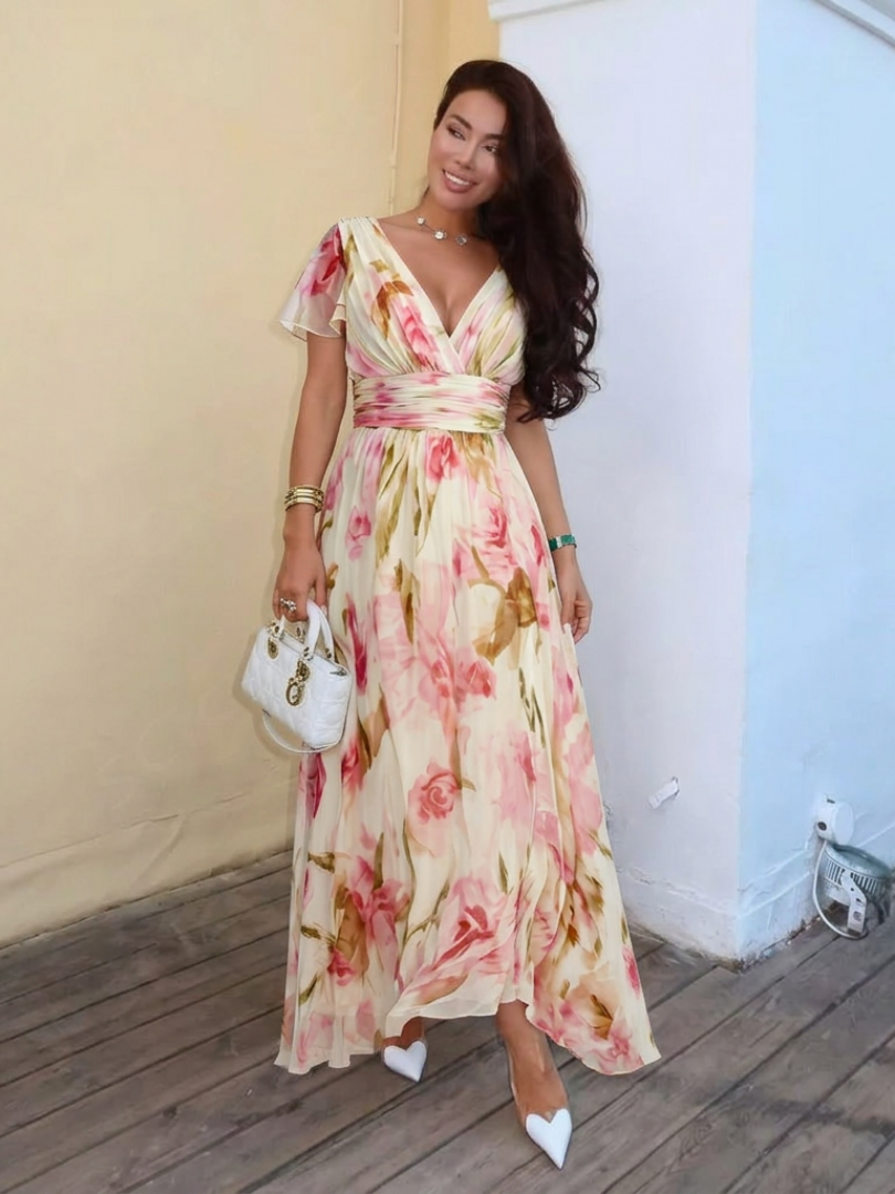 Elara | Vestido Maxi Floral de Manga Corta con Escote en V" can be rewritten as:

"Elara | Maxi Vestido Floral de Manga Corta con Escote en V